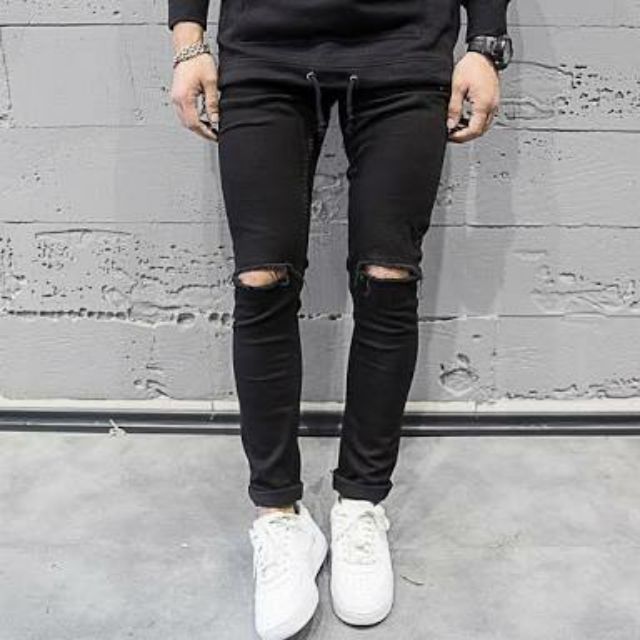 knee cut black jeans