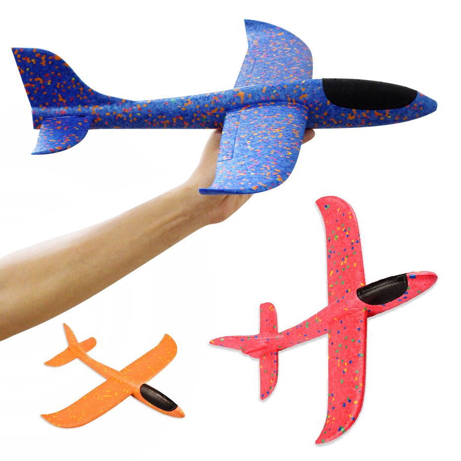 hand throwing airplane