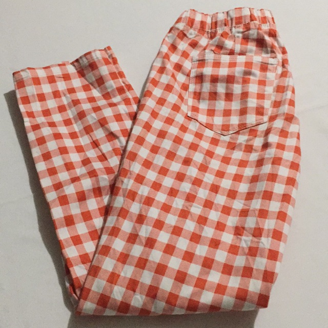 red and white plaid pants
