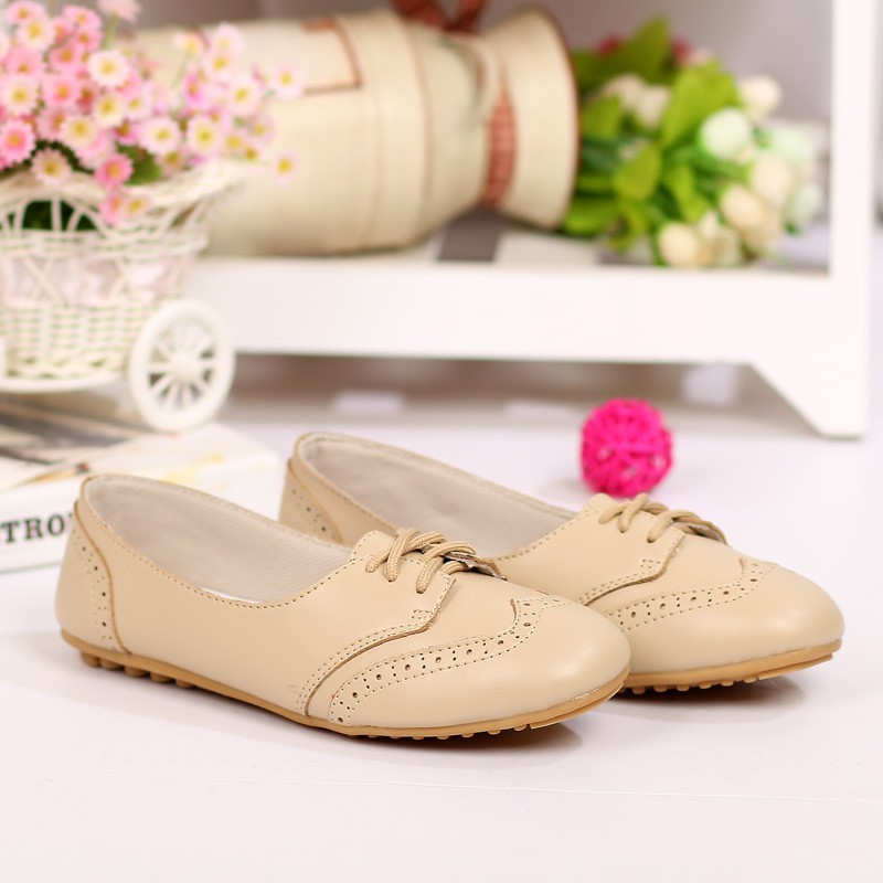 ladies beige flat shoes