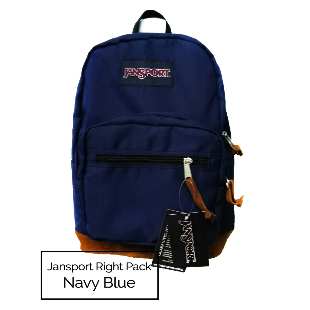 navy blue jansport backpack with leather