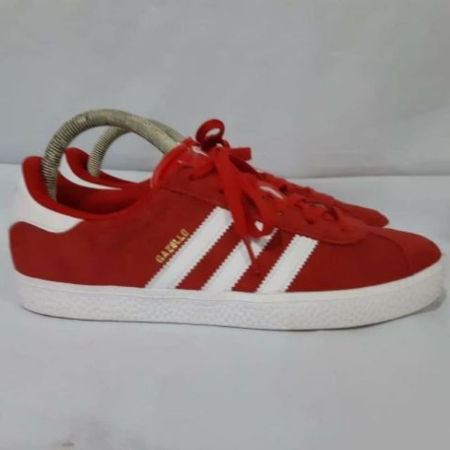 white and red adidas gazelle