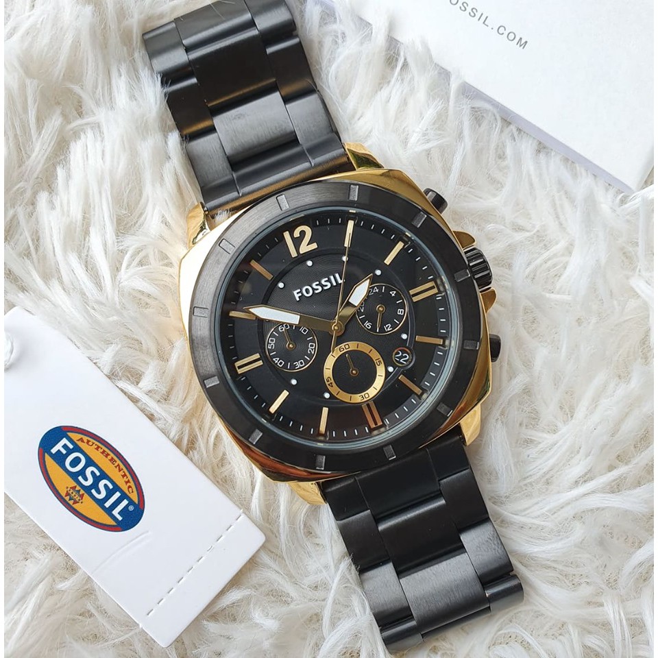 fossil black and gold watch