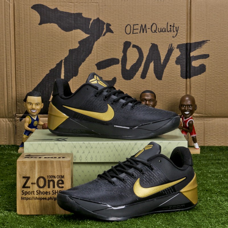 black and gold nike basketball shoes