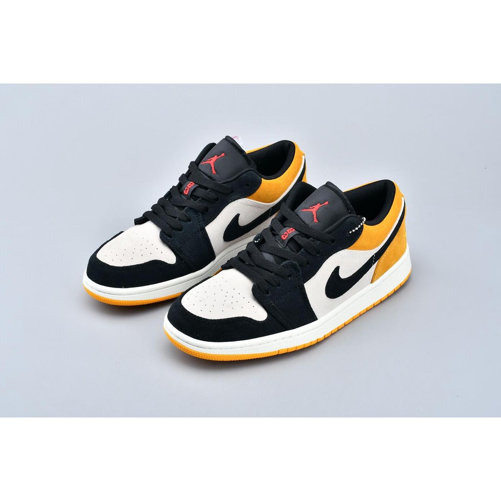 black yellow and white jordan 1