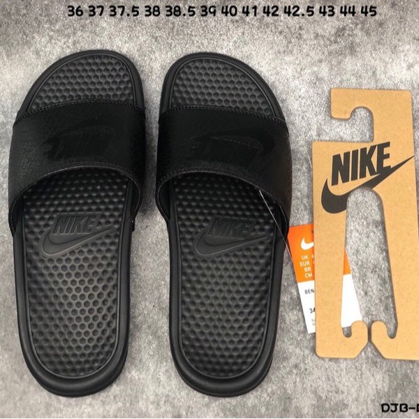 all black nike slippers