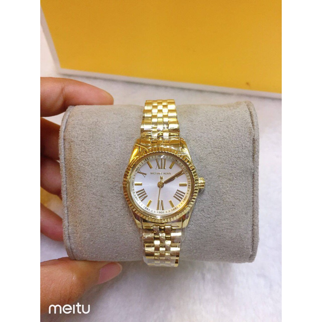 white and gold mk watch