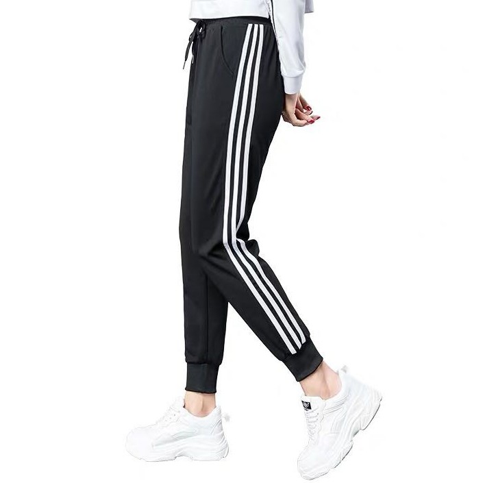 black jogger with white stripe