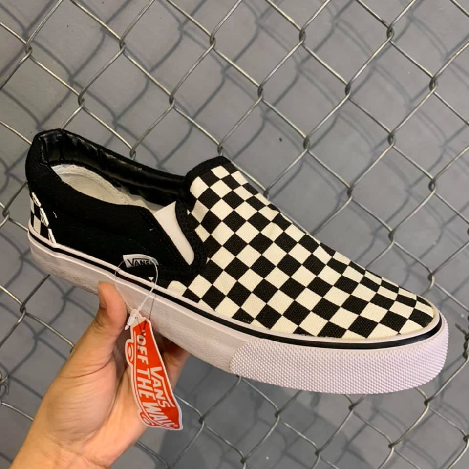 vans checkerboard slip on sizing