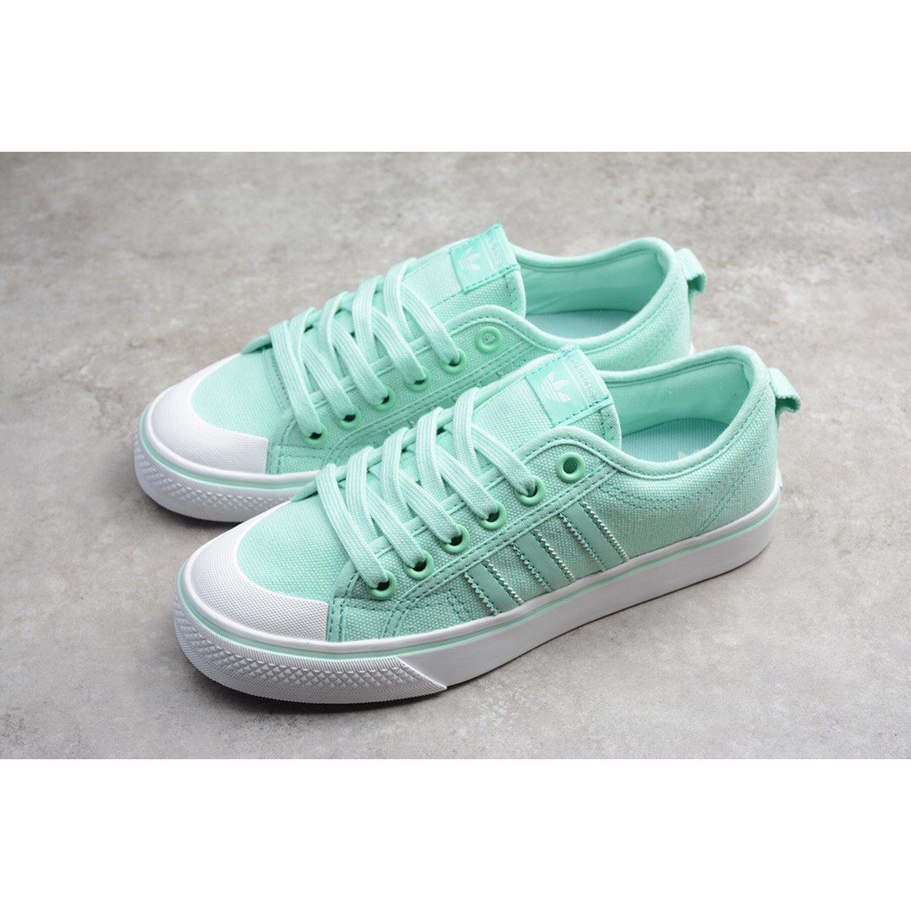 mint green adidas shoes