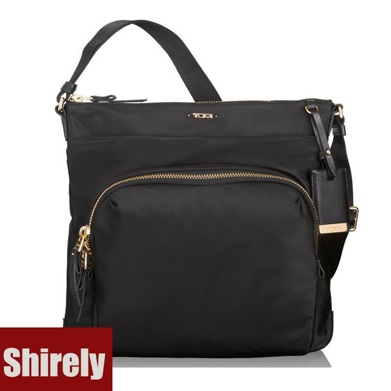 tumi over the shoulder bag