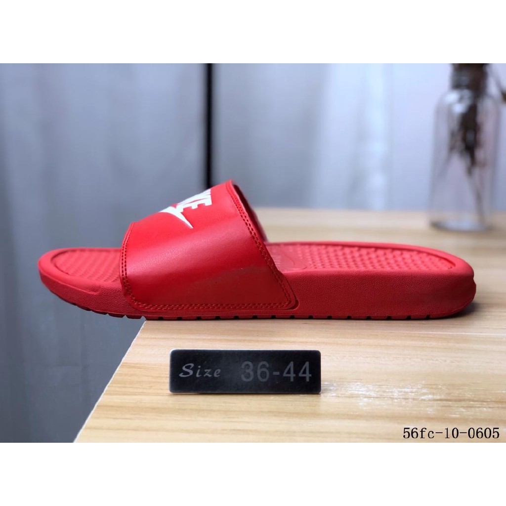 red nike slippers
