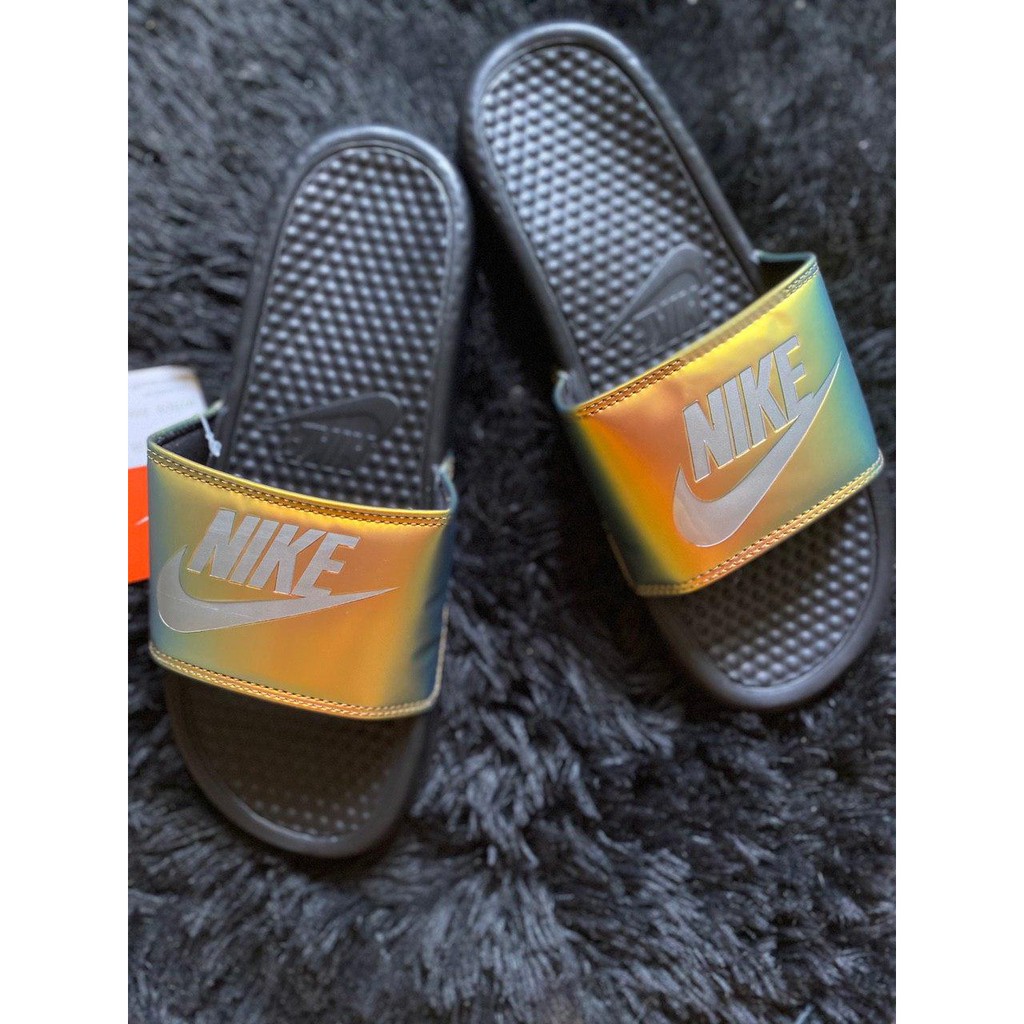 black and gold nike slides