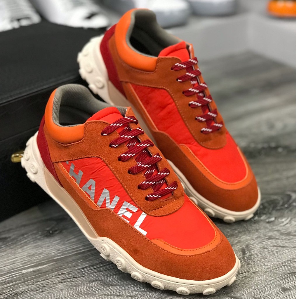 orange high top chanel sneakers