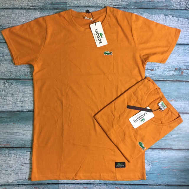 orange lacoste shirt