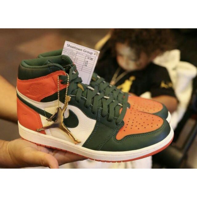 green orange jordan 1