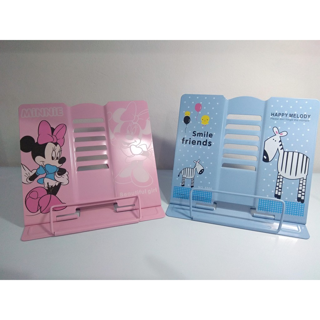 List, book clip holder helps children sit and learn in the correct