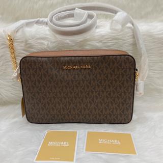 mk jet set sling