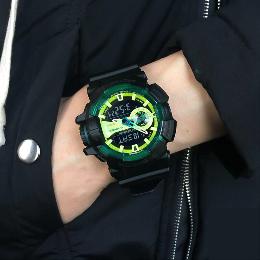 black and green g shock watch