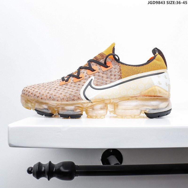 orange vapormax outfit