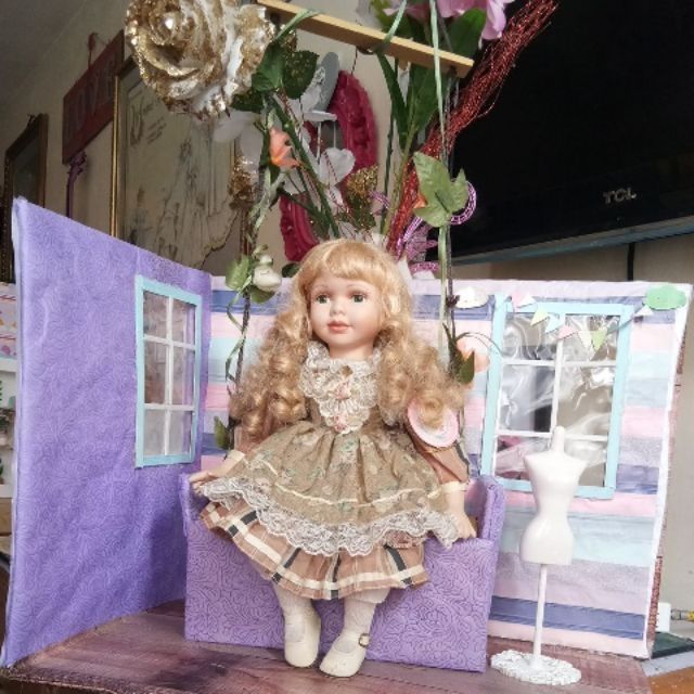 menie porcelain doll