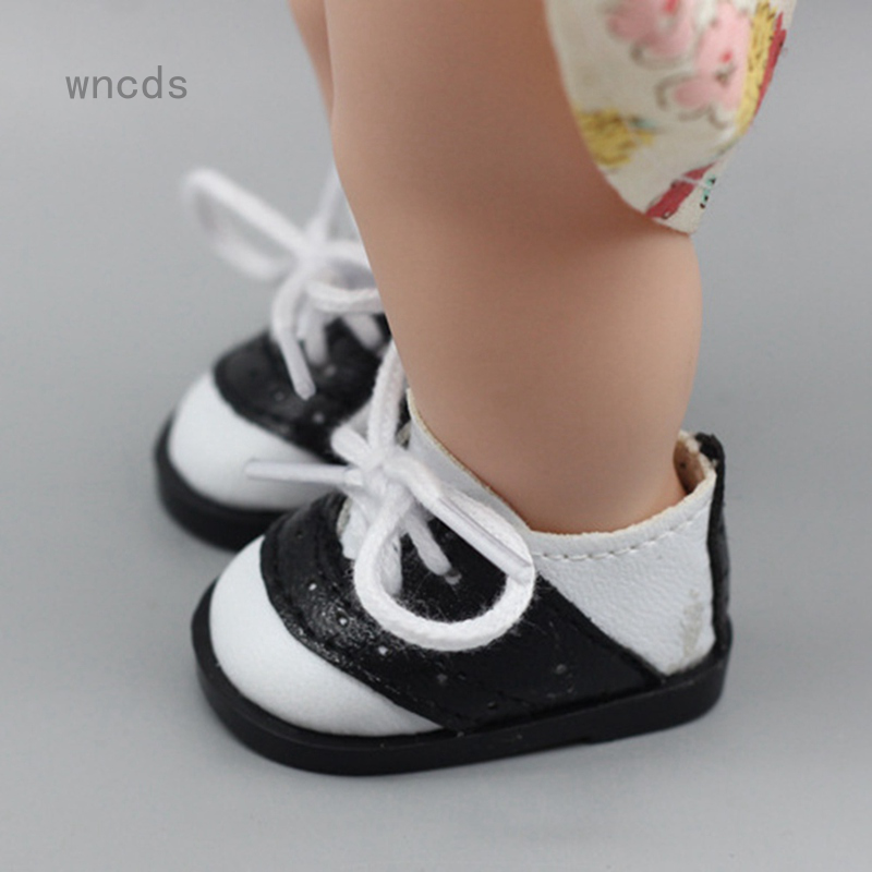 black white saddle oxfords