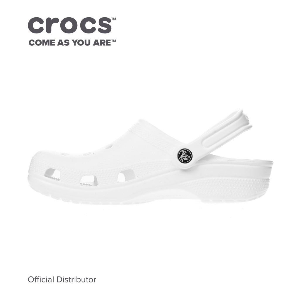 white crocs with rainbow words