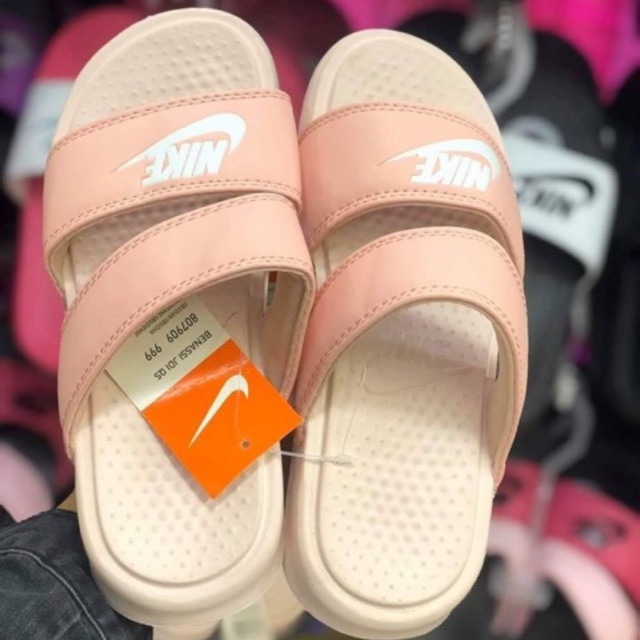 peach nike slides