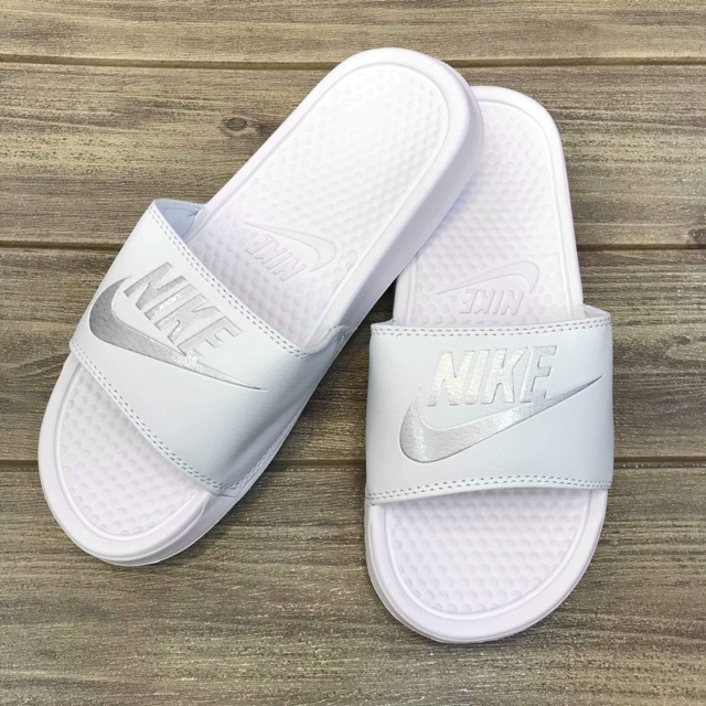 white nikes slides
