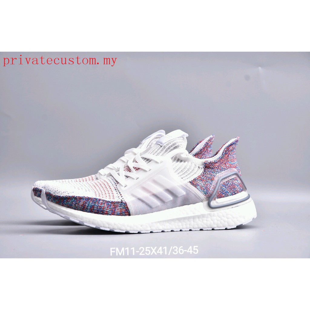 purple and white adidas sneakers