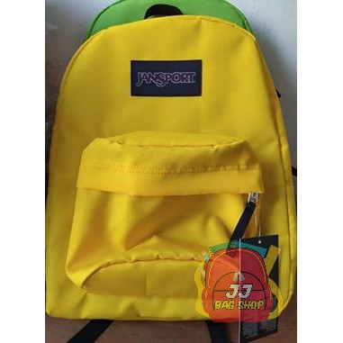 mustard yellow jansport backpack