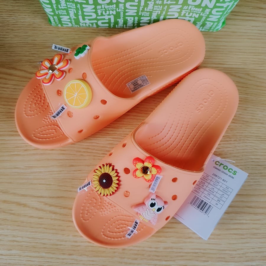 orange crocs slides