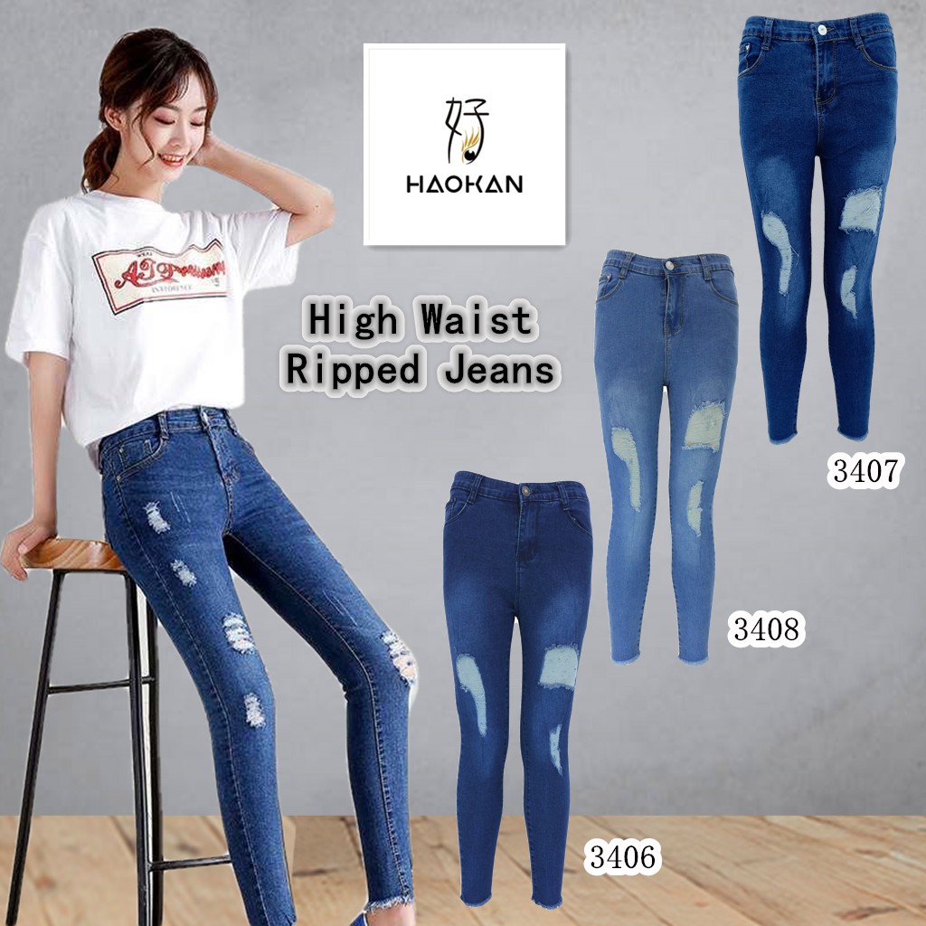 women's blue high waisted ripped jeans