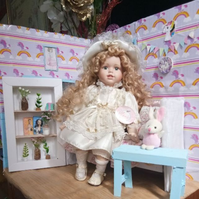 menie porcelain doll