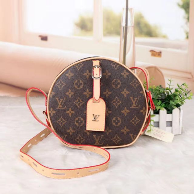 lv round sling bag