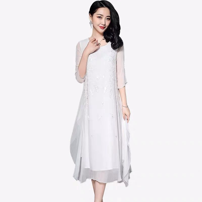 women's white embroidered dress