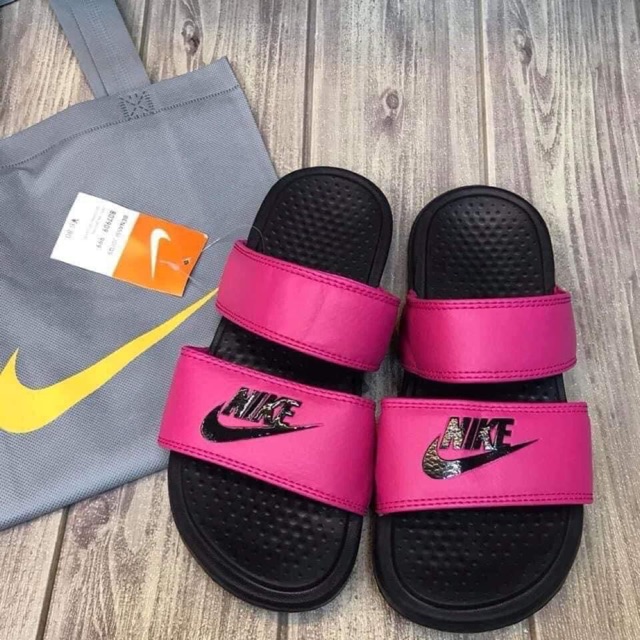 plum nike slides