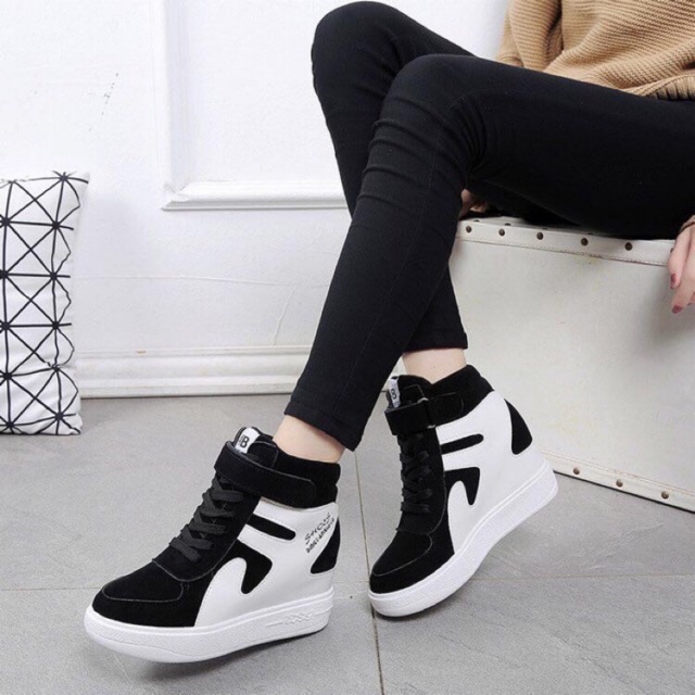 high cut black leather shoes