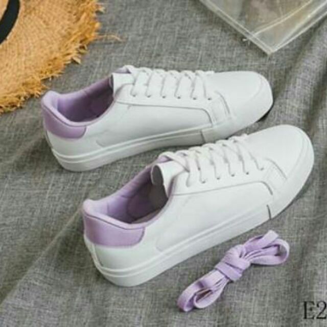 white and purple sneakers