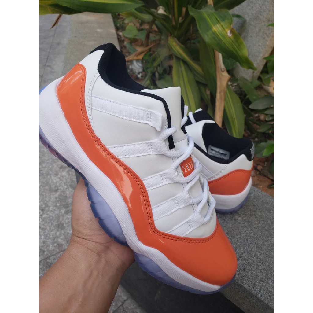 jordan 11 low orange and white