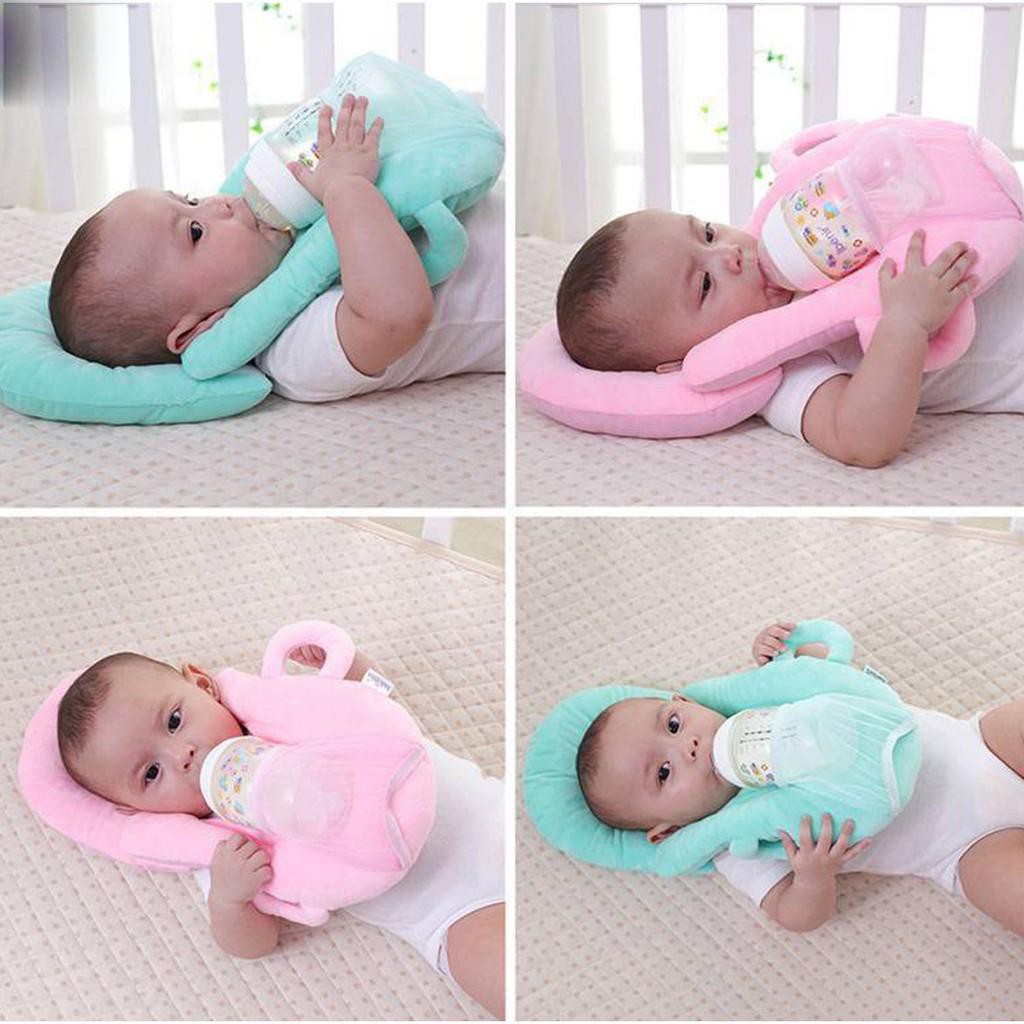 baby pillow with bottle holder