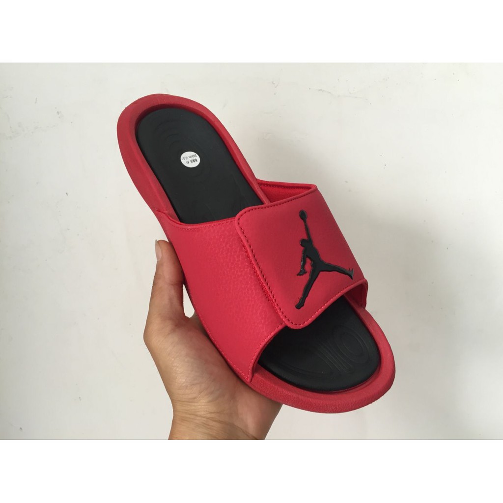 nike black and red flip flops