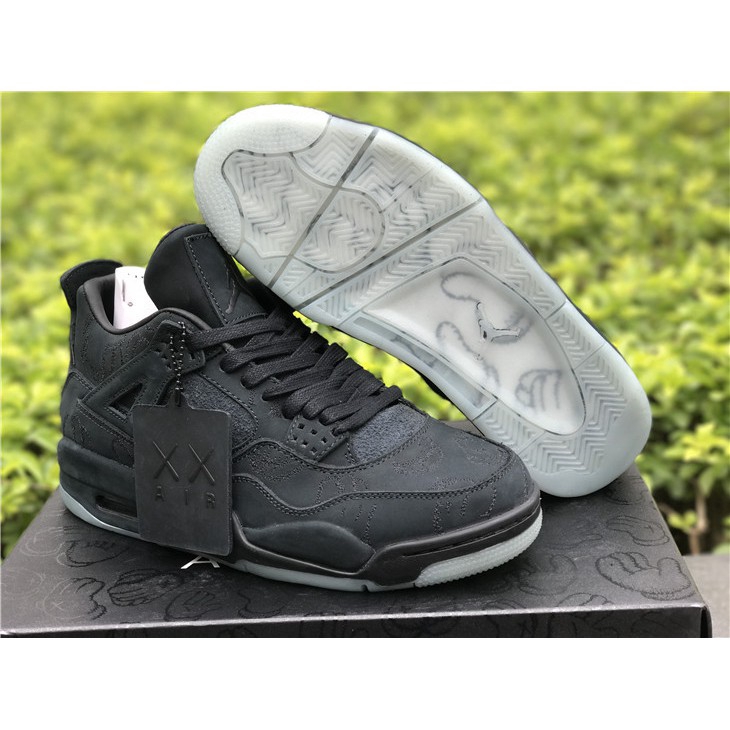 black kaws jordan 4