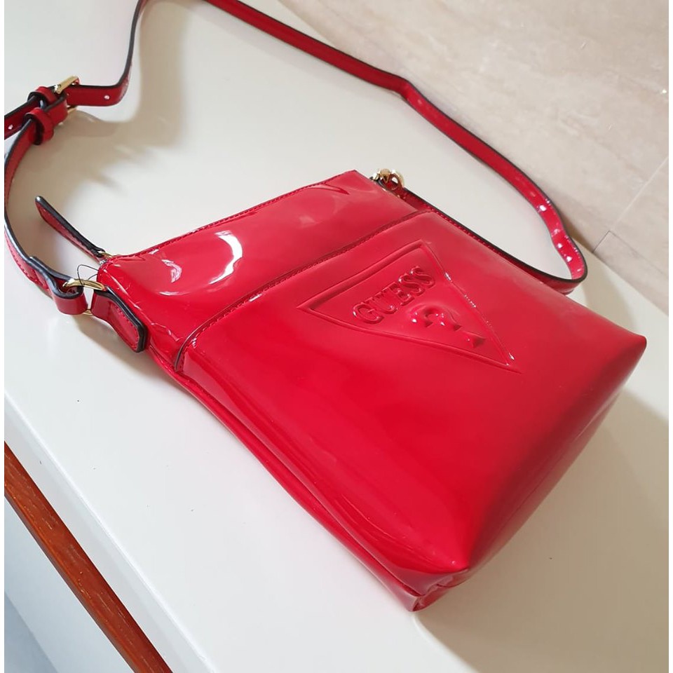 guess red sling bag