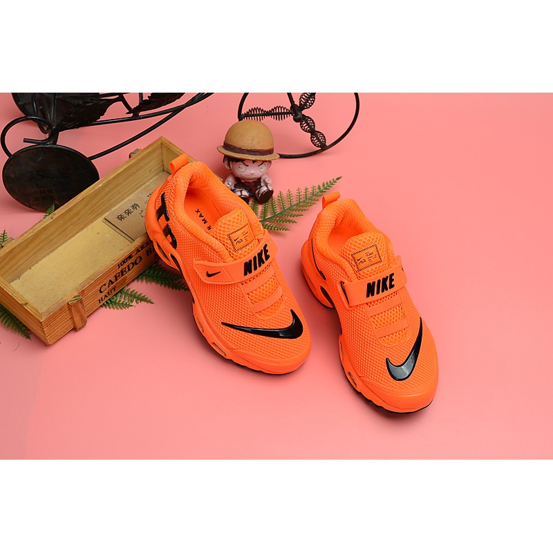 orange nike shoes kids