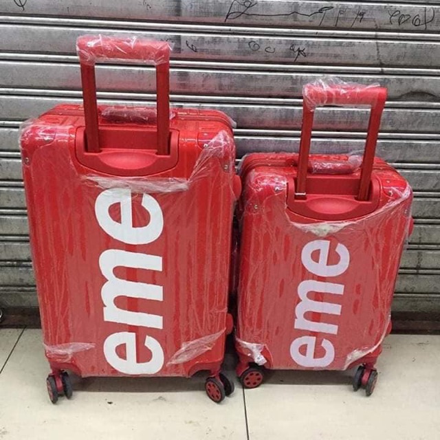 silver supreme trolley bag