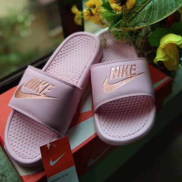 pink nike slippers