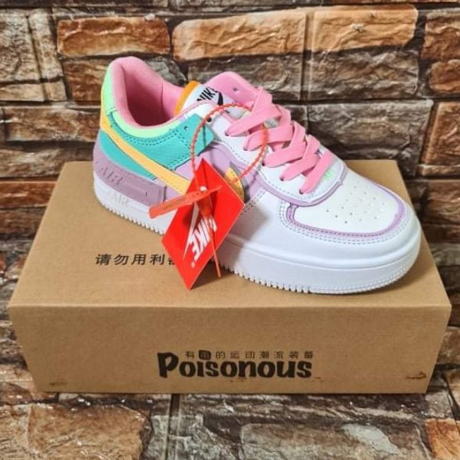 white and pink shoes nike