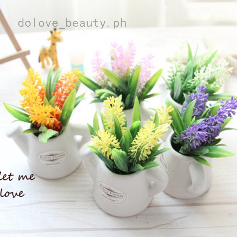 small artificial flowers in vase