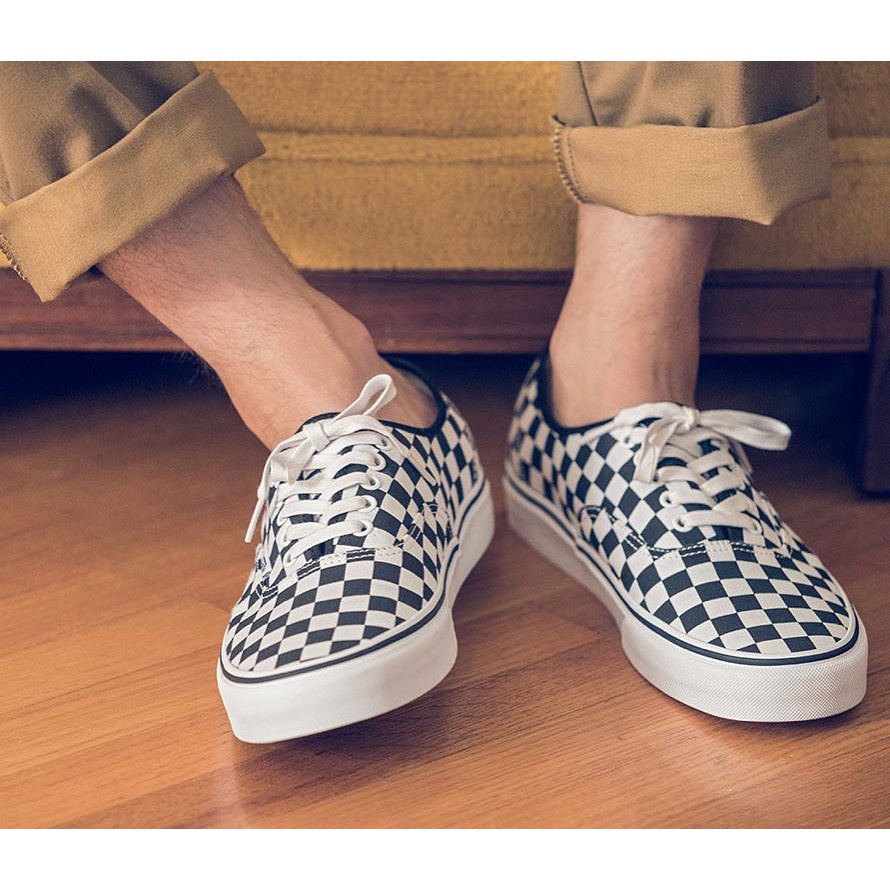 laced checkerboard vans